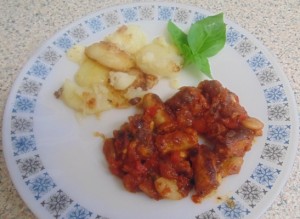 “Schwartz" Cajun Sausage and Butter Bean Stew served with Sautéed Potatoes and chefy Basil Leaf