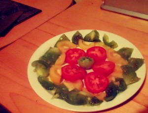 Heirloom Tomato Salad, on the plate before adding the Salsa Verde and Balsamic and Honey dressing