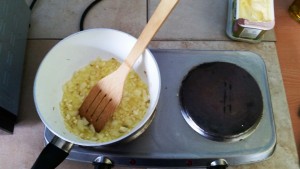 Frying the onion and garlic for my Mystery Bag Meals – Chicken Stroganoff Pie