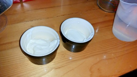 6 Nations of Food – Eggs in pots (oeufs en cocotte) - Adding Crème Fraîche to the ramekin