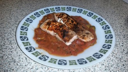 Cajun Salmon on a Mediterranean Sauce - Put the salmon on the sauce