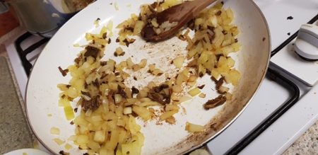 Frying the onions and mushrooms