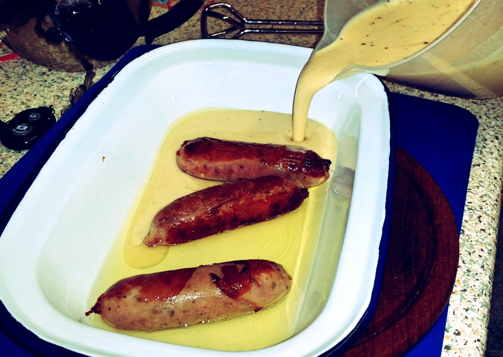 6 Nations of Food – Toad In The Hole, Champ and Onion Gravy - Pouring the batter in to the tin