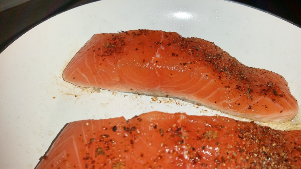 Cajun Salmon on a Mediterranean Sauce - Cook the fish skinned side down