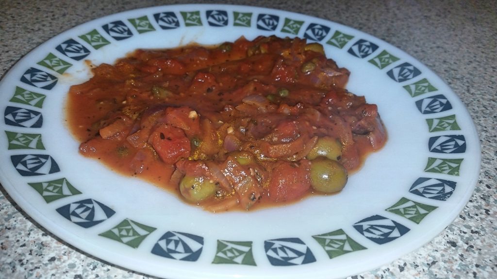 Cajun Salmon on a Mediterranean Sauce - Put the sauce on the plate